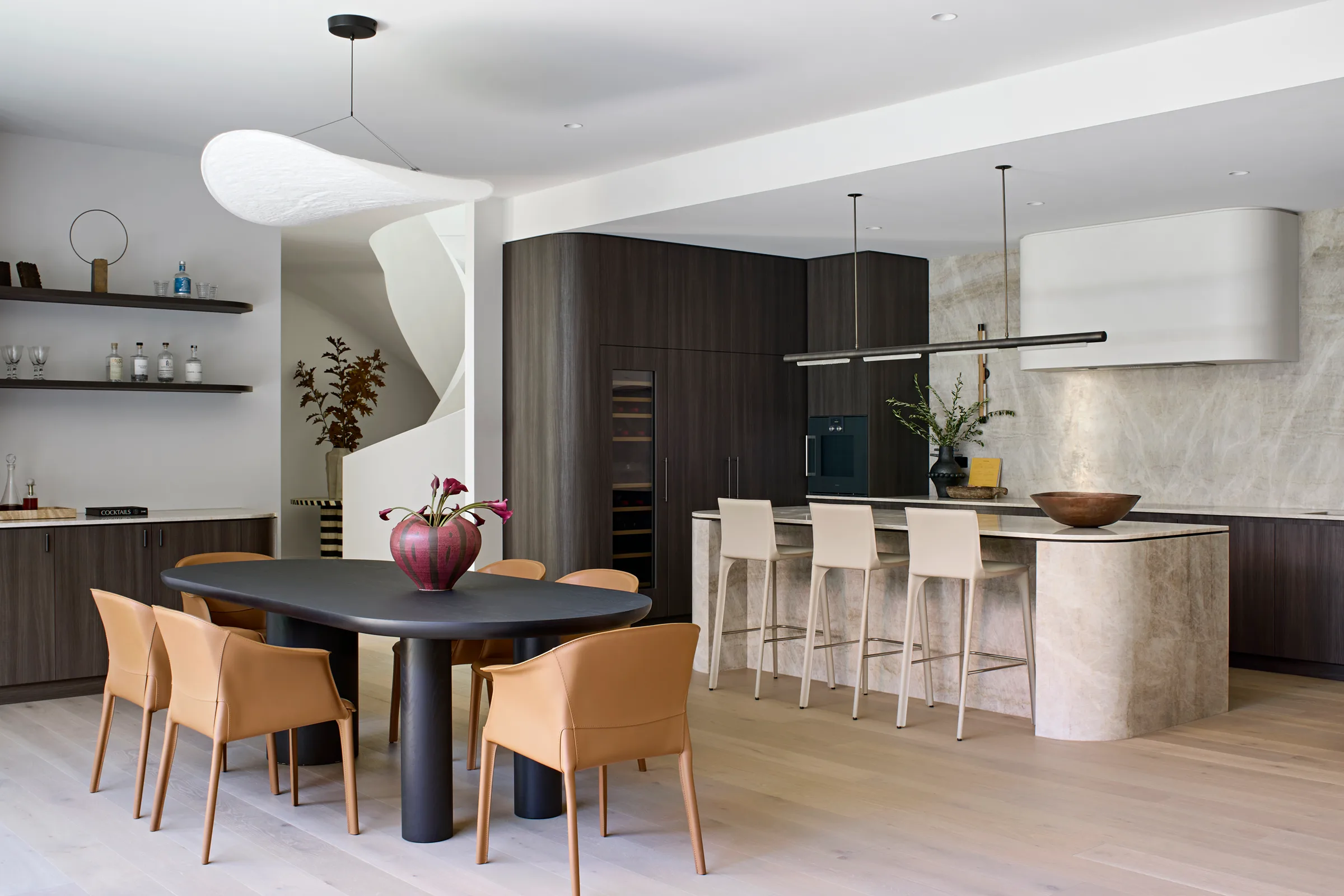 Madden Grove, Kew. Dining beside the kitchen island.