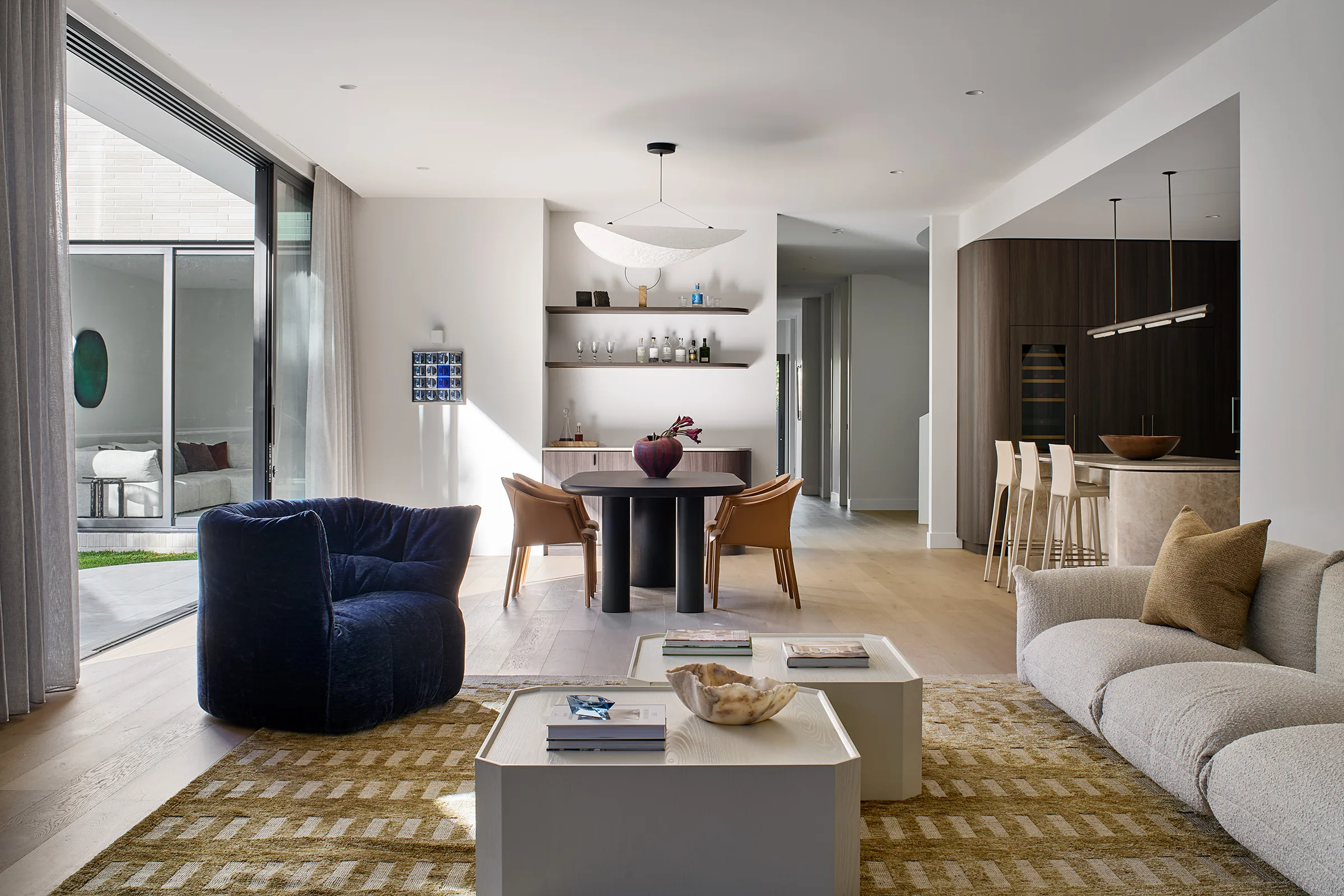 Madden Grove, Kew. Living room looking through to the kitchen.